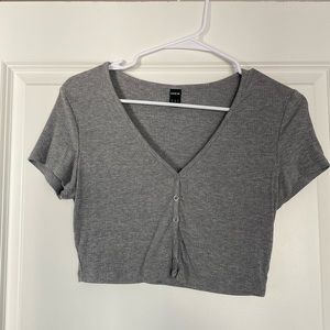 Medium, light grey cropped top with buttons